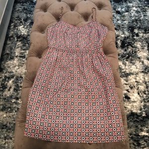 A pink and blue pattern dress